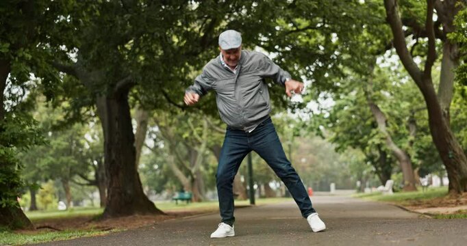 Excited, dancing and elderly man in park with trendy fashion, health or wellness in happy retirement. Smile, energy and fun senior dancer in garden with cool style, celebration and positive attitude