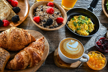 Breakfast served with coffee, eggs, cereals nd croissants