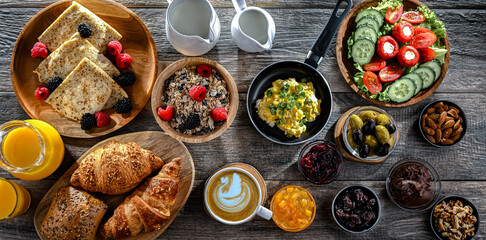 Breakfast served with coffee, eggs, cereals nd croissants