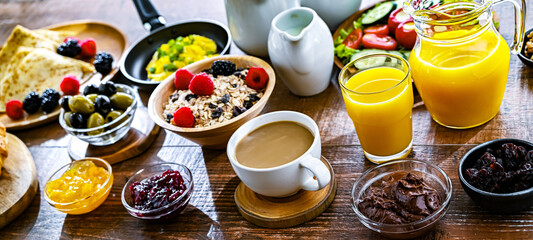 Breakfast served with coffee, eggs, cereals nd croissants