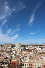 Sunlit Alicante Skyline with Dramatic Blue Sky