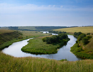 Obraz premium Winding river flows through lush landscapes and green banks under a clear sky. Generative AI