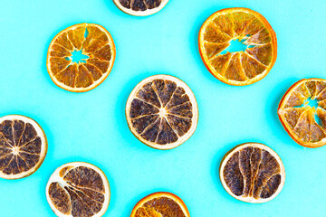 Dried slices citrus pattern on bright blue background