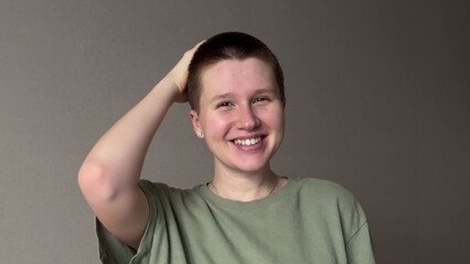 woman happy with short hair. buzz cut