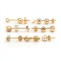 Various gold jewelry, earrings, necklaces etc. on isolated white background