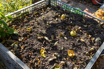 A full compost pile in the garden for the waste