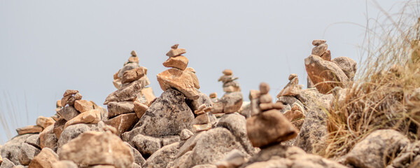 balanced rock stacks tranquility and harmony in the real outside environment, mental equilibrium and meditation concept	