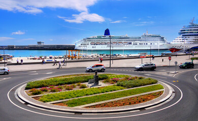 Madeira Funchal waterfront promenade and cruise ship in the port
