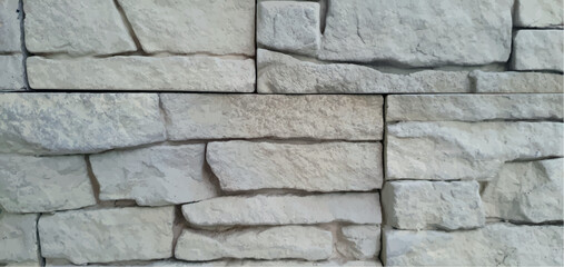 Stone texture background. Brick wall texture, stone road, stone texture, stonework background. Interior and exterior design, facade, fence. Building materials, repair and construction.