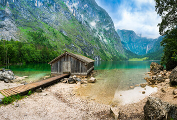 Boat house at Obersee in Berchtesgaden on cloudy summer day