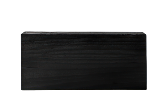 A solid rectangular block of black paint with sharp edges isolated on white background