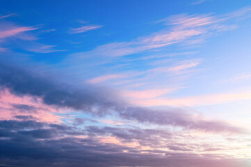 Sunset sky background, colorful sunset sky with cumulus colorful clouds of pink color
