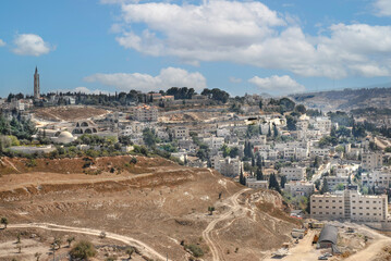 Obraz premium The Mount of Olives is a mountain adjacent to the Jerusalem's Old City. It has been used as a Jewish cemetery for over 3,000 years. In this mount was where Jesus ascended to heaven. Israel, 2016