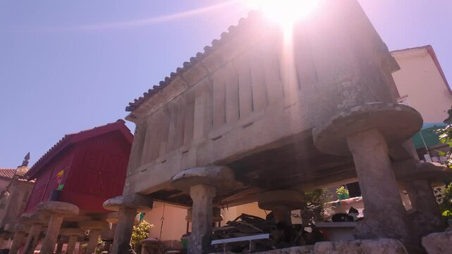 Old stone and wooden constructions to store the grain of the harvest, called Horreos, Combarro, Galicia