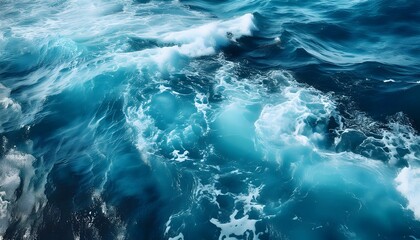 Pure blue turquoise water texture of the ocean sea with foam
