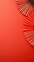 Vibrant red paper fans against a bright backdrop celebrating the joyous spirit of Chinese New Year festivities