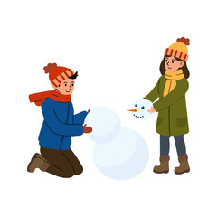 Two children joyfully building a snowman in a winter landscape on a sunny day