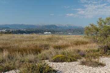View from Alikes beach to the Corinthian Gulf, Ionian Sea and Aigio town. Peloponnese. Greece. Europe.