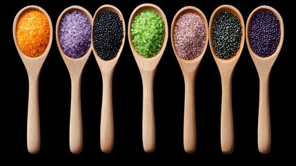 A vibrant array of colorful spices displayed in wooden scoops against a sleek black backdrop, showcasing nature's palette in culinary art