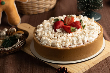 Rustic strawberry meringue tart with a crumbly cookie crust, topped with crushed meringue and fresh...