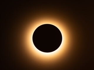Total solar eclipse with glowing corona