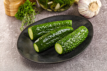 Homemade lighty salted cucumbers with herbs