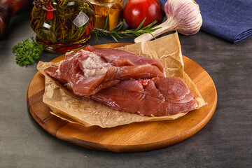 Raw uncooked turkey thigh fillet