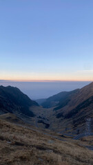 Naklejka premium sunset over the mountains