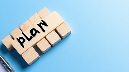 Crafting a thoughtful strategy with wooden cubes and a blank notebook against a minimal backdrop for inspiration and creativity