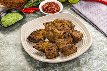 Grilled beef barbecue with spises