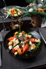 Christmas dinner salad on the table in a restaurant close-up