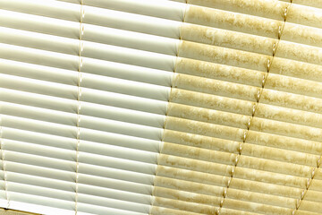 Residential Window Shades Showing the Before and After of a Good Cleaning - One Side Clean and One...