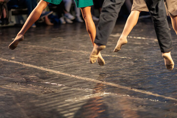 contemporary dance performance taking a leap on theater stage