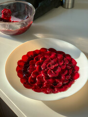 A Vibrant and Colorful Beetroot Salad Artfully Arranged on a White Elegant Plate to Delight
