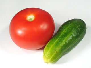 Fresh Plump Plum Tomatoes Among Vibrant Green Plants in a Natural Food Setting