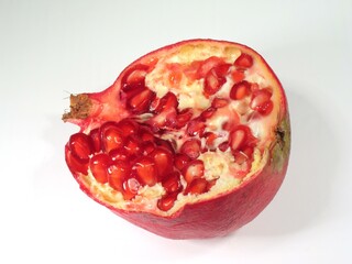Close-Up of Pomegranate Halves with Juicy Seeds