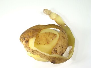 Partially Peeled Potato on White Background