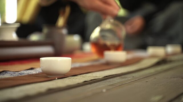 Tea ceremony. Chinese Tea Tasting Ceremony with Master. Traditional Chinese Hot Drink