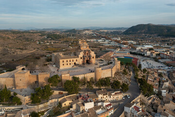 Obraz premium Aerial view of Caravaca De La Cruz cityscape and castle