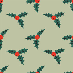 Delicate holly leaves with berries arranged on a light green background in festive pattern design