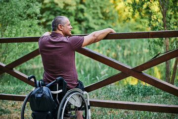 Man in Wheelchair Enjoying Nature