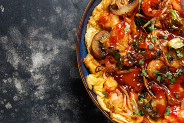 Foo Young Chinese egg omelette filled with vegetables, mushrooms, shrimp and sauce