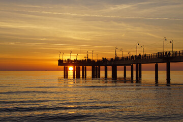 pier in the sunset in marina di pietrasanta