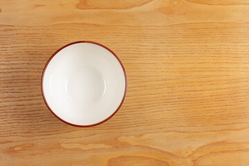 Empty White Bowl on Wooden Table

