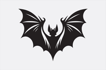 A black silhouette of a flying bat with outstretched wings.