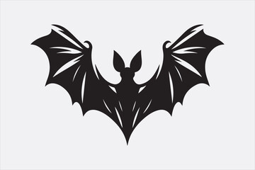 A black silhouette of a flying bat with outstretched wings.