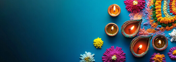 Happy Diwali celebration with colorful, traditional rangoli and oil lamps