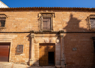 Baroque facade of the Molina de la Cerda mansion in Baños de la Encina, Jaen, Andalucia, Spain, with daylight