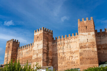 View of the walls and turrets of the medieval castle of Burgalimar in Baos de la Encina, Jan, Andalusia, Spain
