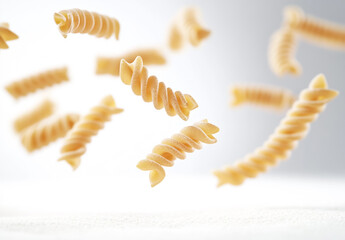 Naklejka premium Italian fusilli pasta on white background 